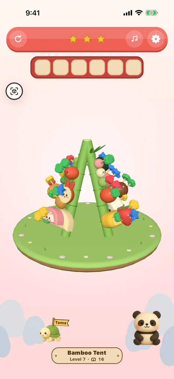 A stage of Panda Garden: foods pinned round the bamboo by picks, on a grass island you turn