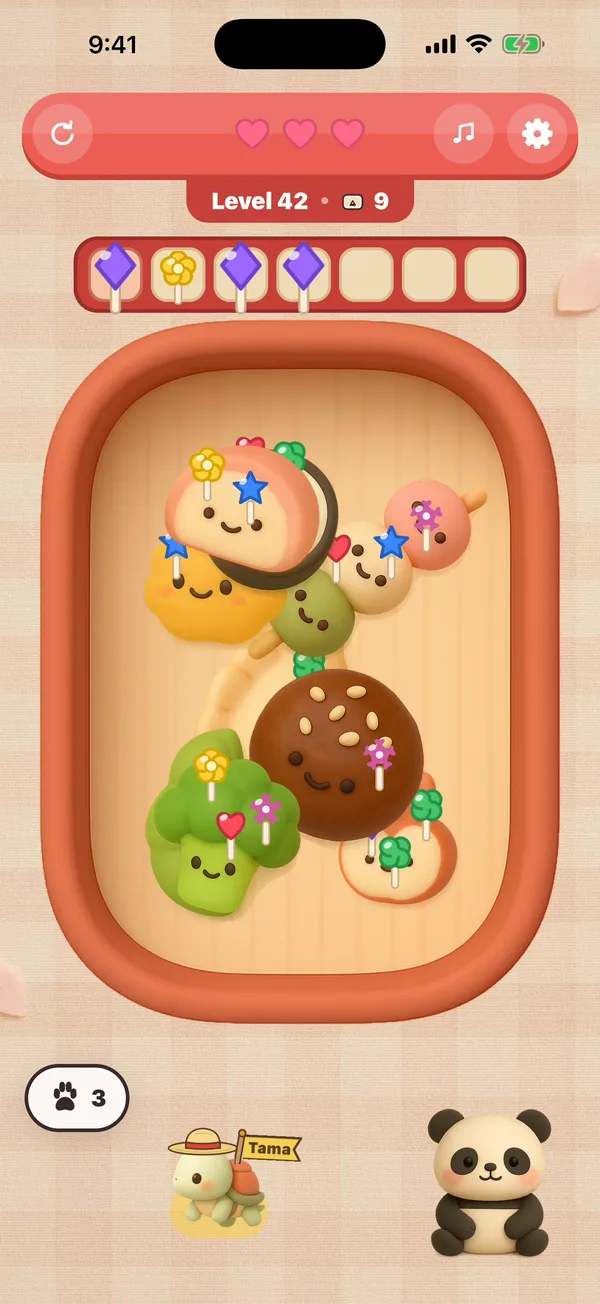 A level of Panda Bento Jam: a bento full of foods held by picks
